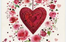 Fotografia kartki z czerwonym sercem i różami wokół. Napis w. j. angielskim „Dla mojej Walentynki”