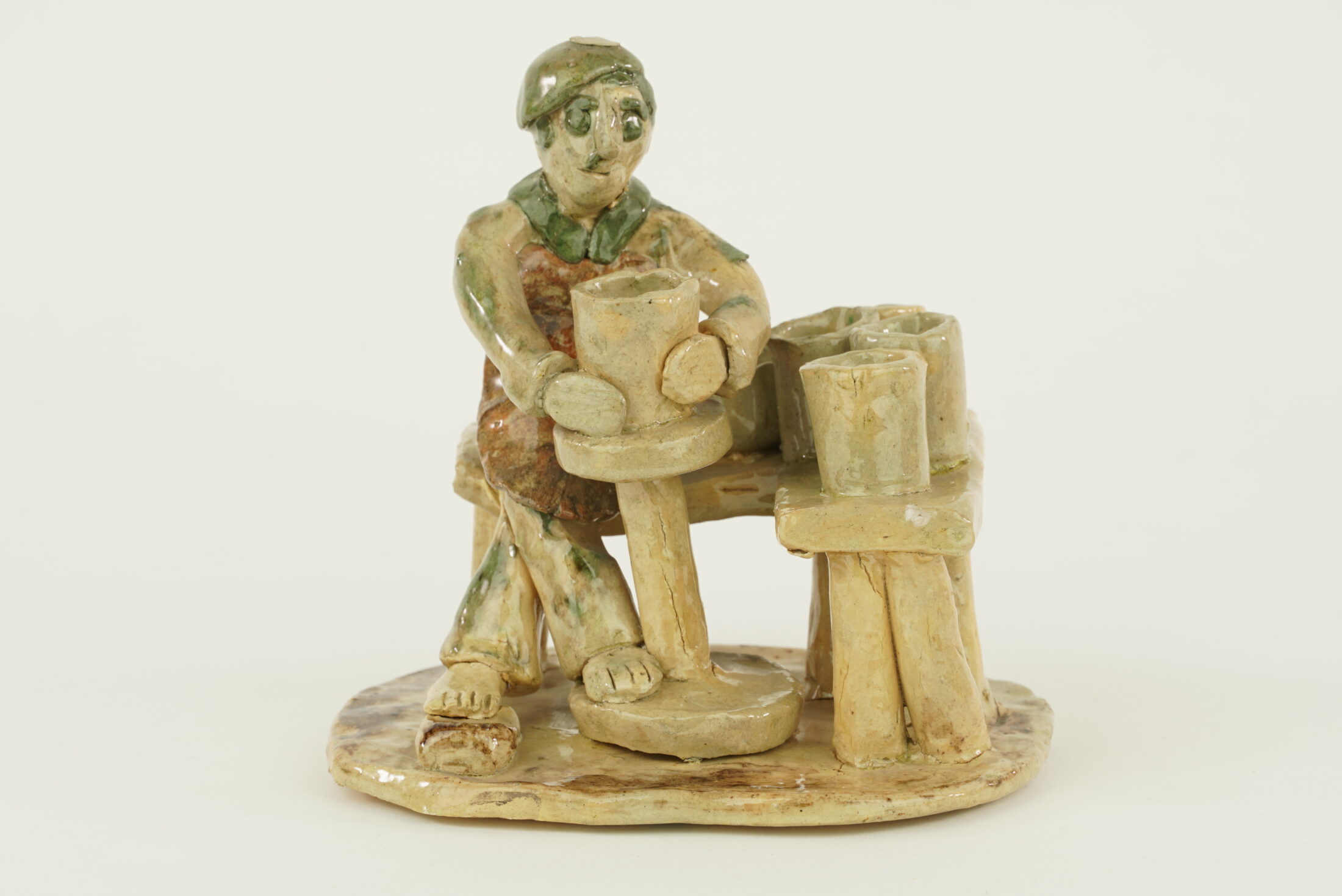 Mężczyzna przy kole garncarskim - rzeźba