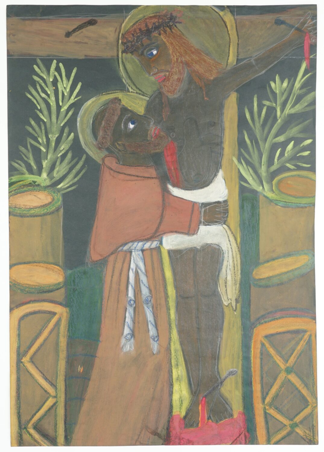 Mężczyzna w zakonnym habicie przytula się do ukrzyżowanego Jezusa