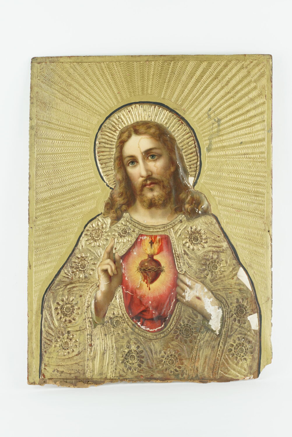 Obraz święty przedstawiający długowłosego mężczyznę z sercem